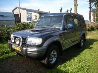 Schade scooter Hyundai Galloper 2.5 TCI High Roof exceed uitvoering met oa airco, 4wd enz 2002/8